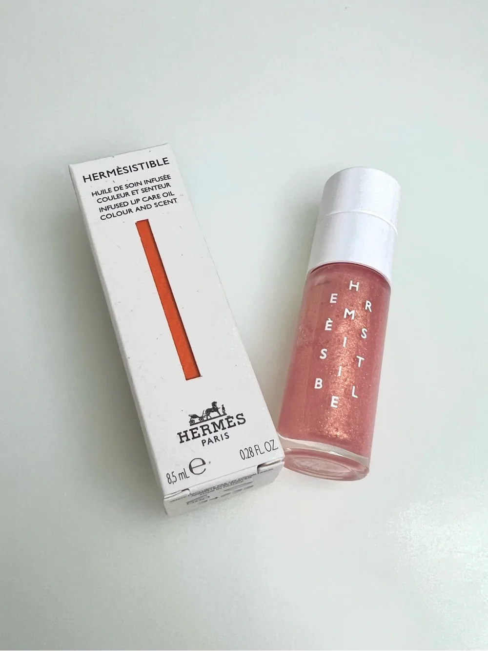 ☀️New Hermes Hermèsistible Infused Care Lip Oil #10 “Rose Nashi”☀️